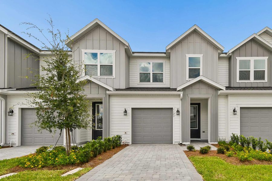 Representative exterior photo of a completed home built from the The Burney by David Weekley Homes in Preserve at The Cays – The Harbor Series, Daytona Beach, FL (Image 1). Representative exterior photo of a completed home built from the The Burney by David Weekley Homes in Preserve at The Cays – The Harbor Series, Daytona Beach, FL (Image 1).