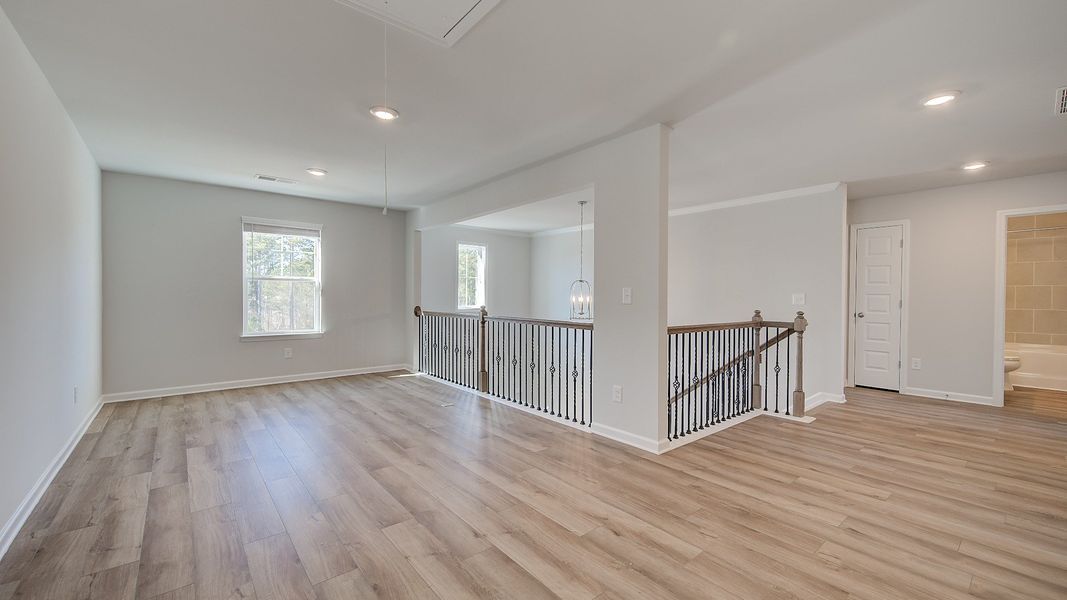 Furnished interior view inside a new home in Westwind Estates, Hampton (Image 18).