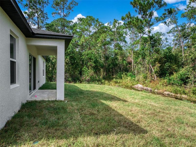 Exterior details and patio area of a home in , Sebring (Image 26).