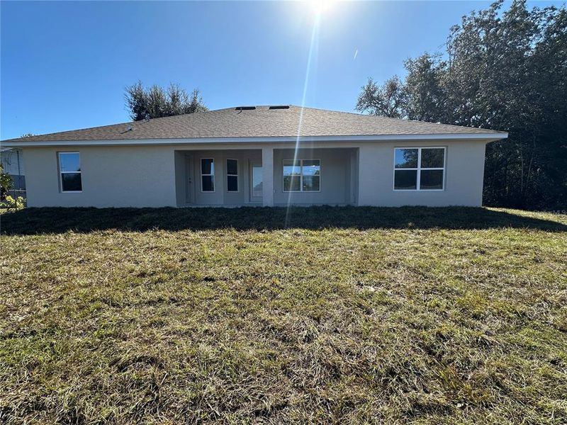 Exterior details and patio area of a home in , Ocala (Image 4).