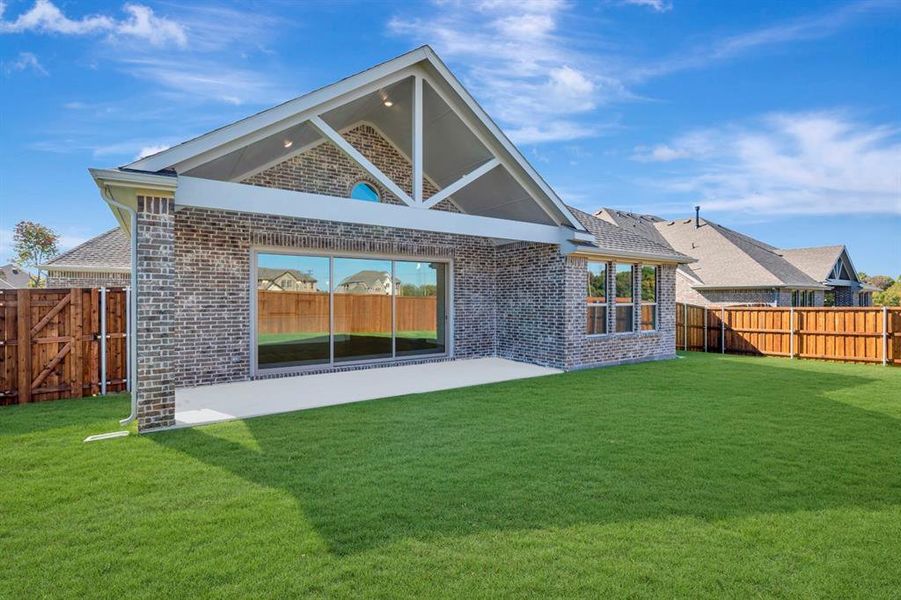 Exterior details and patio area of a home in Kreymer at the Park, Wylie (Image 2). Exterior details and patio area of a home in Kreymer at the Park, Wylie (Image 2).