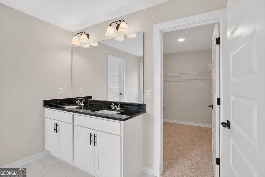 Furnished interior view inside a new home in The Fairways at Mirror Lake, Villa Rica (Image 25).