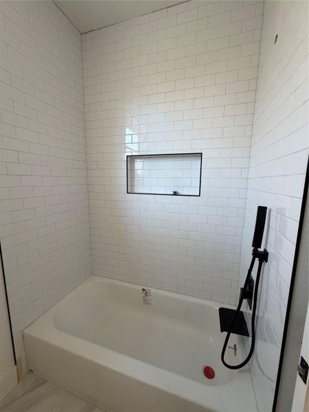 Full bath with tub / shower combination