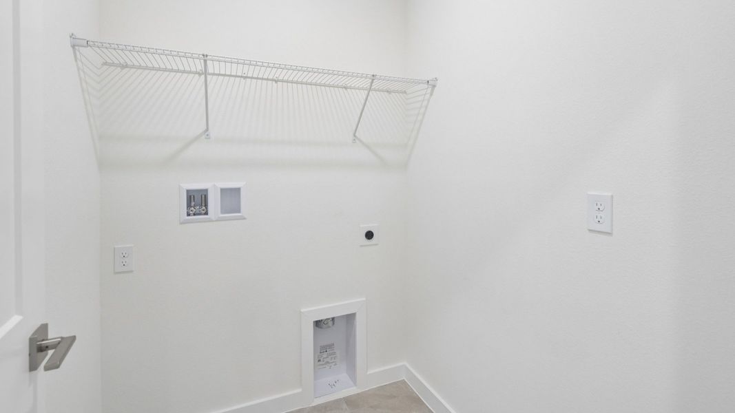 Furnished interior view inside a new home in Grasslands West, Lakeland (Image 30).