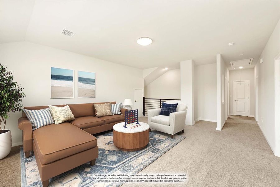Upstairs loft or bonus room with sectional sofa, carpet flooring, and hallway leading to bedrooms Upstairs loft or bonus room with sectional sofa, carpet flooring, and hallway leading to bedrooms