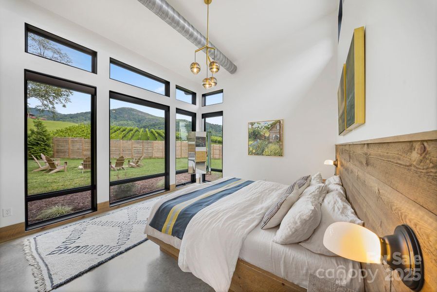 Primary bedroom with a view you won't want to leave