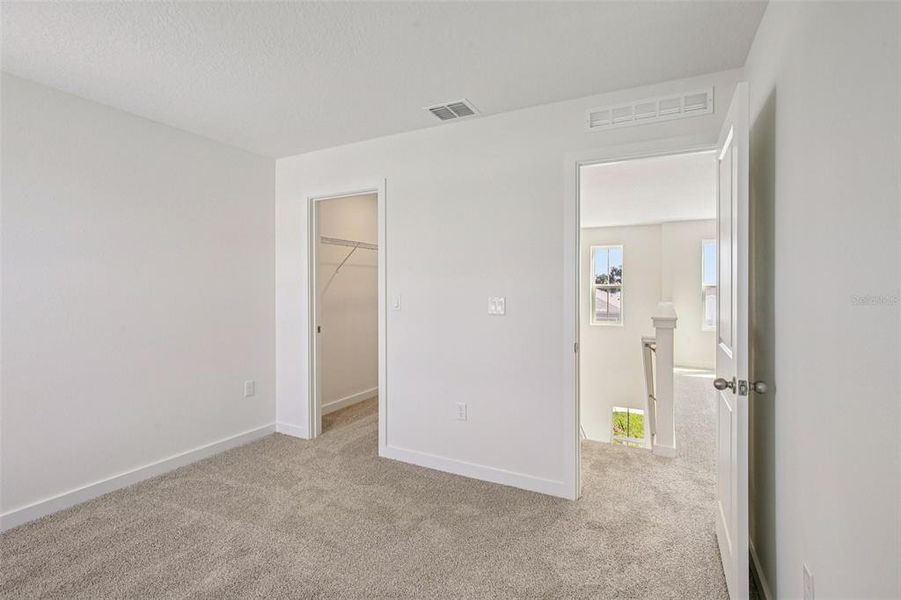 Spacious, unfurnished interior of a new home in Willowbrook North, Winter Haven (Image 27).