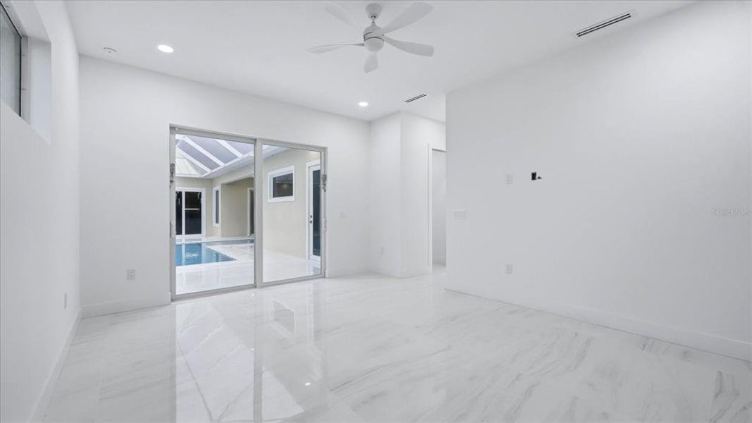 Spacious, unfurnished interior of a new home in , Port Charlotte (Image 40).