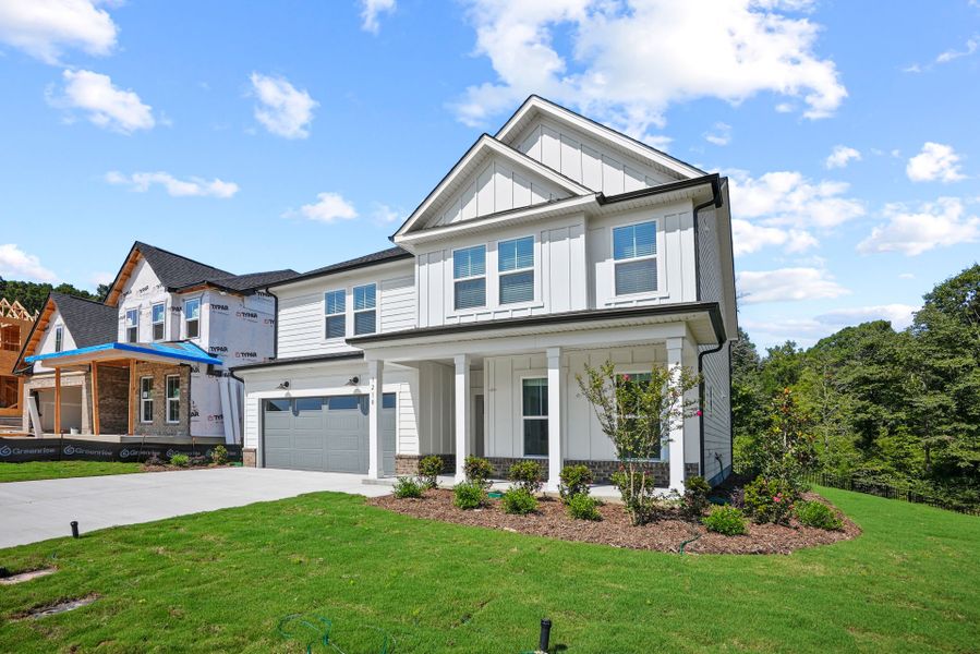 Front exterior of a new home in Elmbrook, Indian Trail, NC, highlighting curb appeal (Image 38). Front exterior of a new home in Elmbrook, Indian Trail, NC, highlighting curb appeal (Image 38).