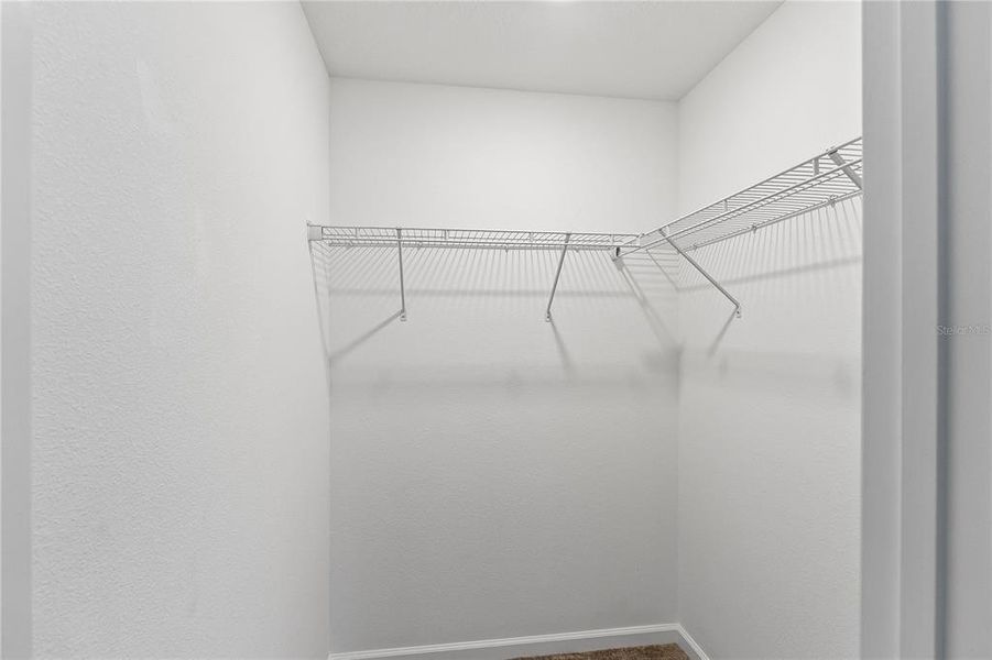 Spacious, unfurnished interior of a new home in Storey Creek: Manor Collection, Kissimmee (Image 31).