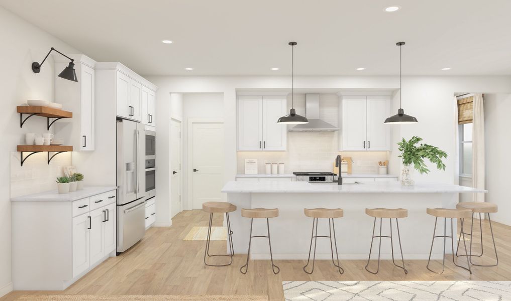 Kitchen with pendant lighting and stainless steel appliances