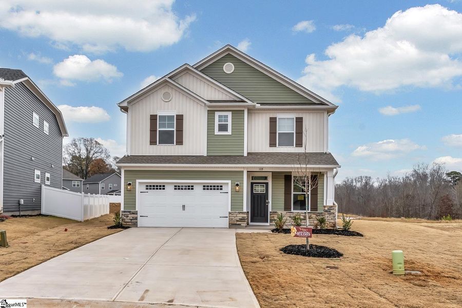 Front exterior of a new home in Sedona, Greenville, SC, highlighting curb appeal (Image 1). Front exterior of a new home in Sedona, Greenville, SC, highlighting curb appeal (Image 1).