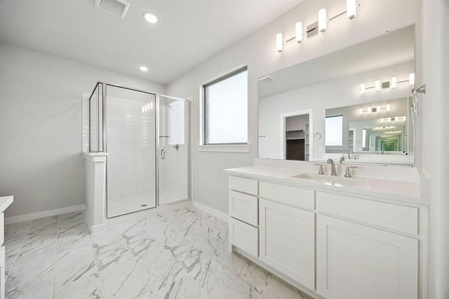Primary Bathroom in the Wimbledon home plan by Trophy Signature Homes – REPRESENTATIVE PHOTO Primary Bathroom in the Wimbledon home plan by Trophy Signature Homes – REPRESENTATIVE PHOTO