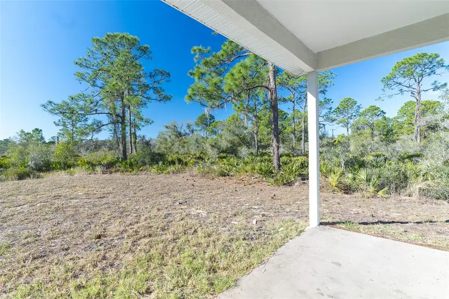 Exterior details and patio area of a home in , Lake Placid (Image 3).