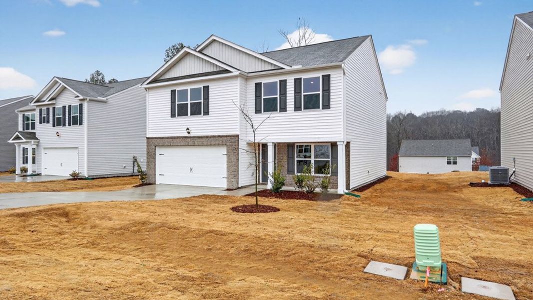 Exterior details and patio area of a home in Wilson's Ridge, Wilson's Mills (Image 3).
