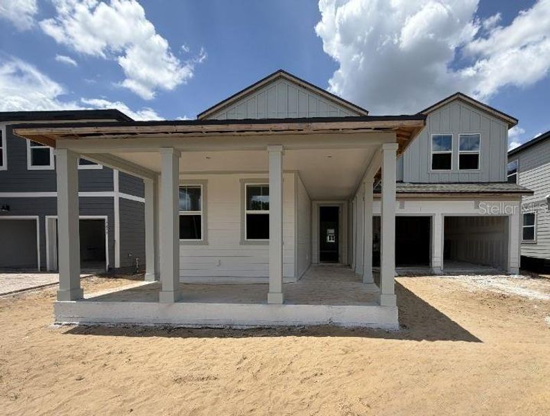 Exterior details and patio area of a home in Northlake at Ovation, Winter Garden (Image 3).