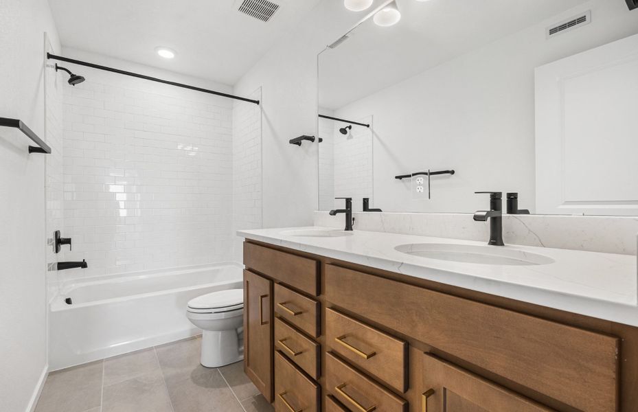 Furnished interior view inside a new home in Harvest Crossing, Aurora (Image 9).