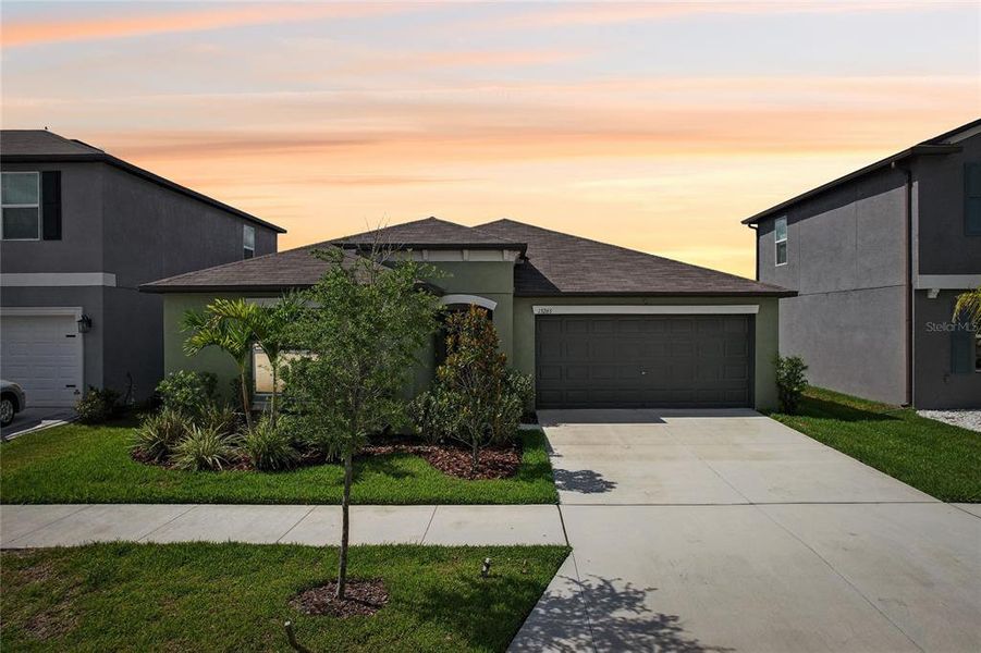 Front exterior of a new home in , Riverview, FL, highlighting curb appeal (Image 23).