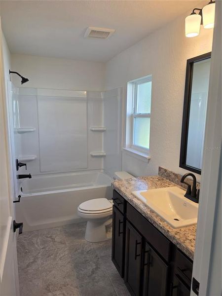 Furnished interior view inside a new home in Spring Hill, Spring Hill (Image 5).