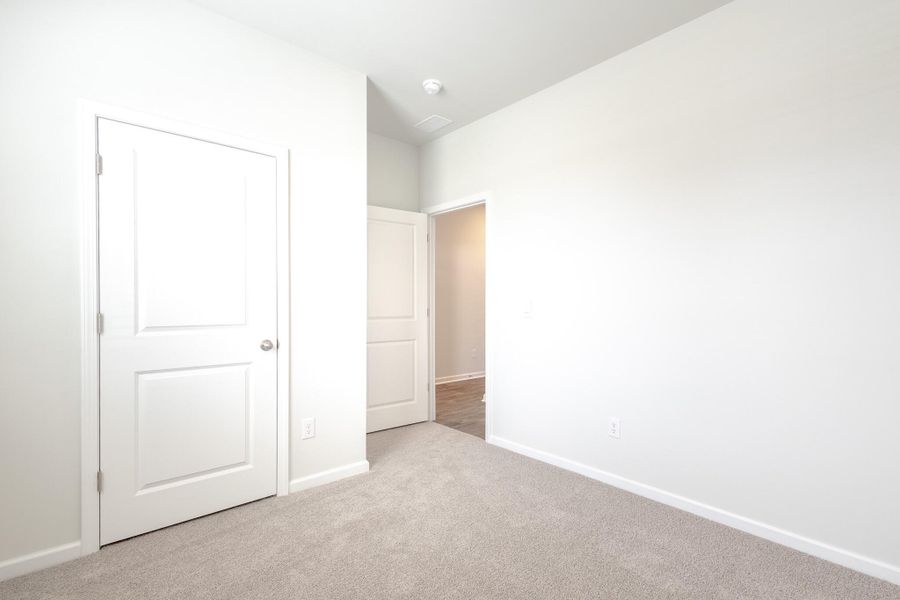 Spacious, unfurnished interior of a new home in Pine Hills at Cane Bay, Summerville (Image 21).