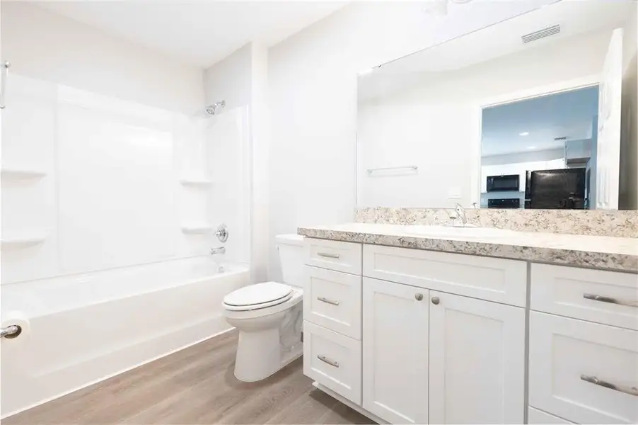 Furnished interior view inside a new home in , Bushnell (Image 10).