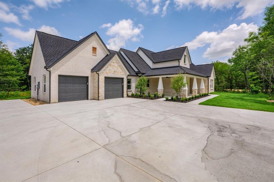 Front exterior of a new home in , Terrell, TX, highlighting curb appeal (Image 2).