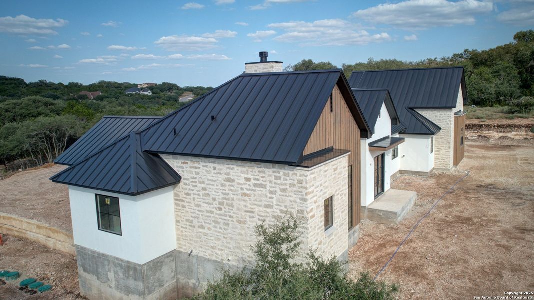 Front exterior of a new home in , New Braunfels, TX, highlighting curb appeal (Image 5). Front exterior of a new home in , New Braunfels, TX, highlighting curb appeal (Image 5).