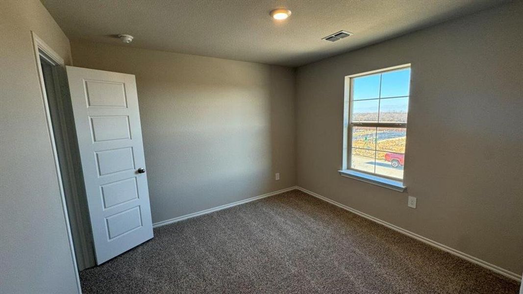 Spacious, unfurnished interior of a new home in Monarch at the Meadows, Ponder (Image 13).