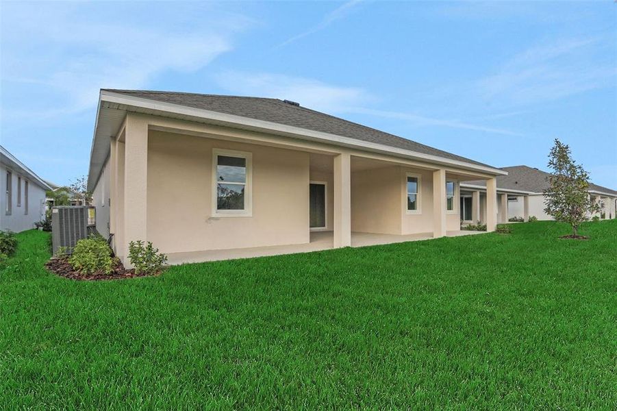 Exterior details and patio area of a home in Seaire, Parrish (Image 3).