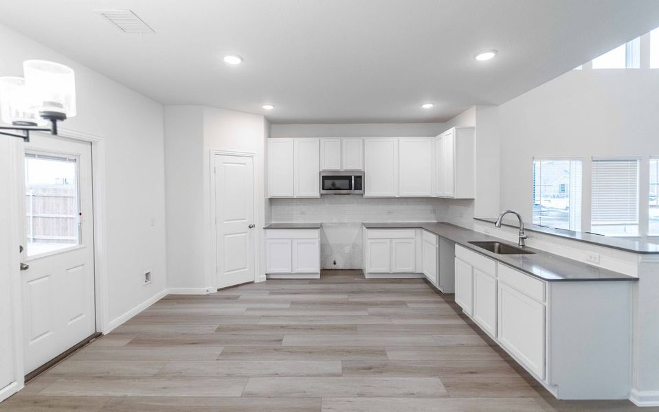 Furnished interior view inside a new home in Pebblebrook, Sherman (Image 3).