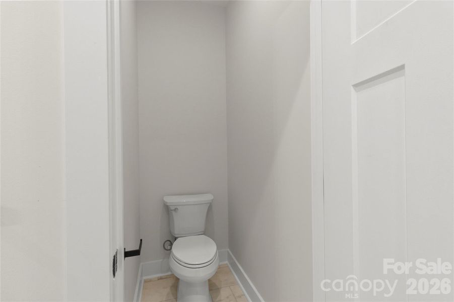 Primary bathroom water closet. Privacy for toilet use