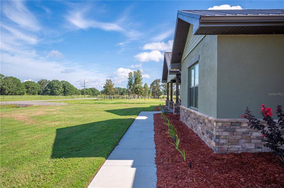 Front exterior of a new home in , Lakeland, FL, highlighting curb appeal (Image 20).