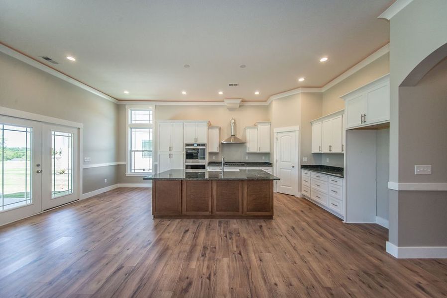 Representative unfurnished interior of a home built from the Beaumont Elite by Enchanted Homes in Pointe Summit, Slater-Marietta (Image 37).