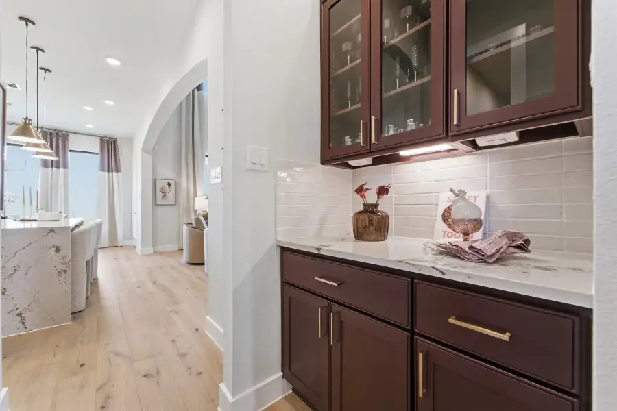 Representative furnished interior of a home built from the Laguna III by CastleRock Communities in Lakesong, Grand Prairie (Image 14).