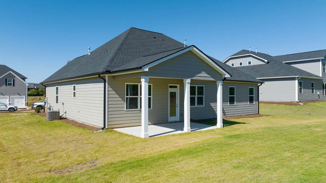 Front exterior of a new home in The Gates at Pates Creek, Hampton, GA, highlighting curb appeal (Image 18).