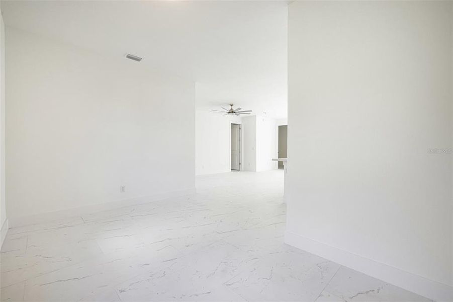 Spacious, unfurnished interior of a new home in , Port Charlotte (Image 32).