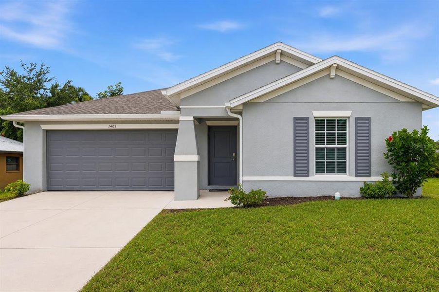 Front exterior of a new home in , Port Charlotte, FL, highlighting curb appeal (Image 1). Front exterior of a new home in , Port Charlotte, FL, highlighting curb appeal (Image 1).