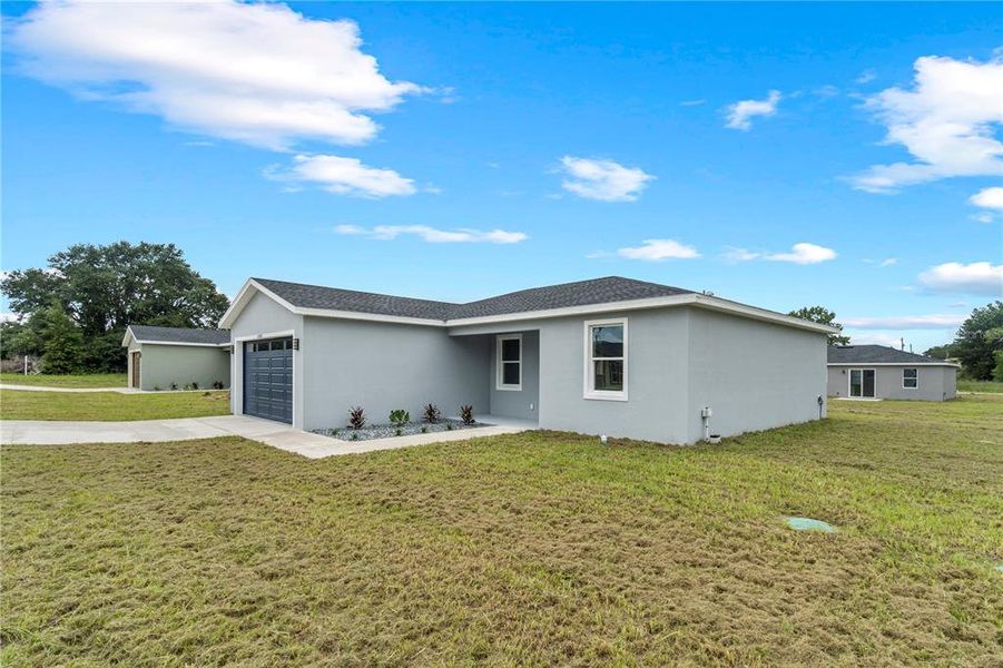 Front exterior of a new home in , Dunnellon, FL, highlighting curb appeal (Image 20). Front exterior of a new home in , Dunnellon, FL, highlighting curb appeal (Image 20).