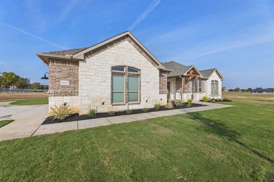 Exterior details and patio area of a home in , Godley (Image 24). Exterior details and patio area of a home in , Godley (Image 24).
