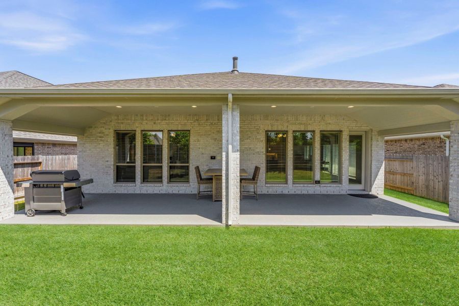 Massive Rear Covered Patio Expands the Entire Back of Home, Plumbed for Gas to add your Outdoor Kitchen! Massive Rear Covered Patio Expands the Entire Back of Home, Plumbed for Gas to add your Outdoor Kitchen!