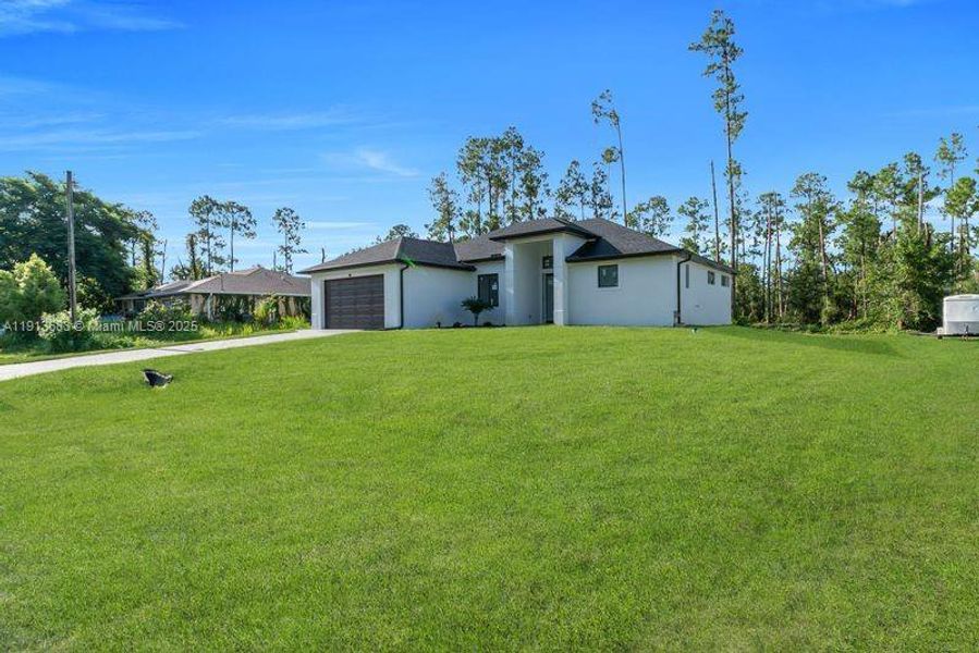 Exterior details and patio area of a home in , Lehigh Acres (Image 28).