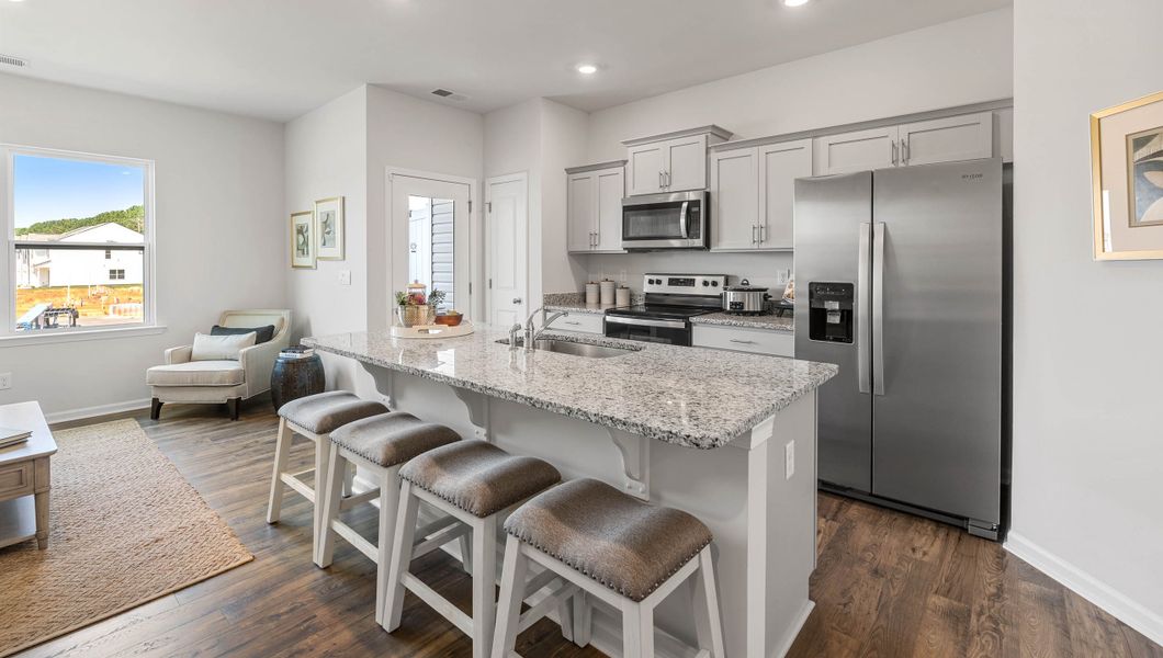 Furnished interior view inside a new home in Tanglewood Townes, Greenville (Image 7).