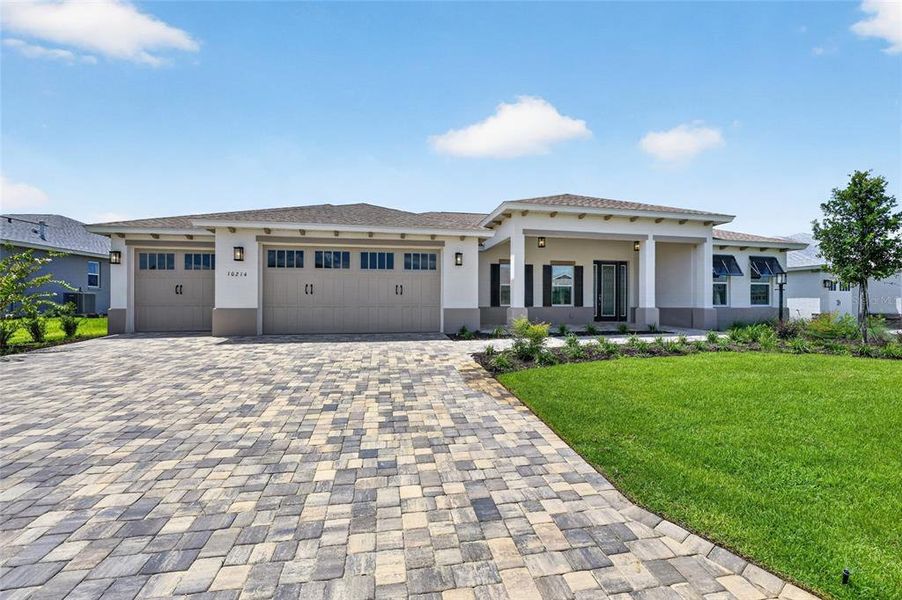 Front exterior of a new home in , Ocala, FL, highlighting curb appeal (Image 27).