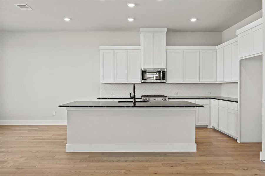 Furnished interior view inside a new home in North Square at Uptown, Celina (Image 6).