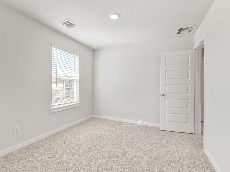 Spacious, unfurnished interior of a new home in Lakes at Black Oak, Magnolia (Image 33).