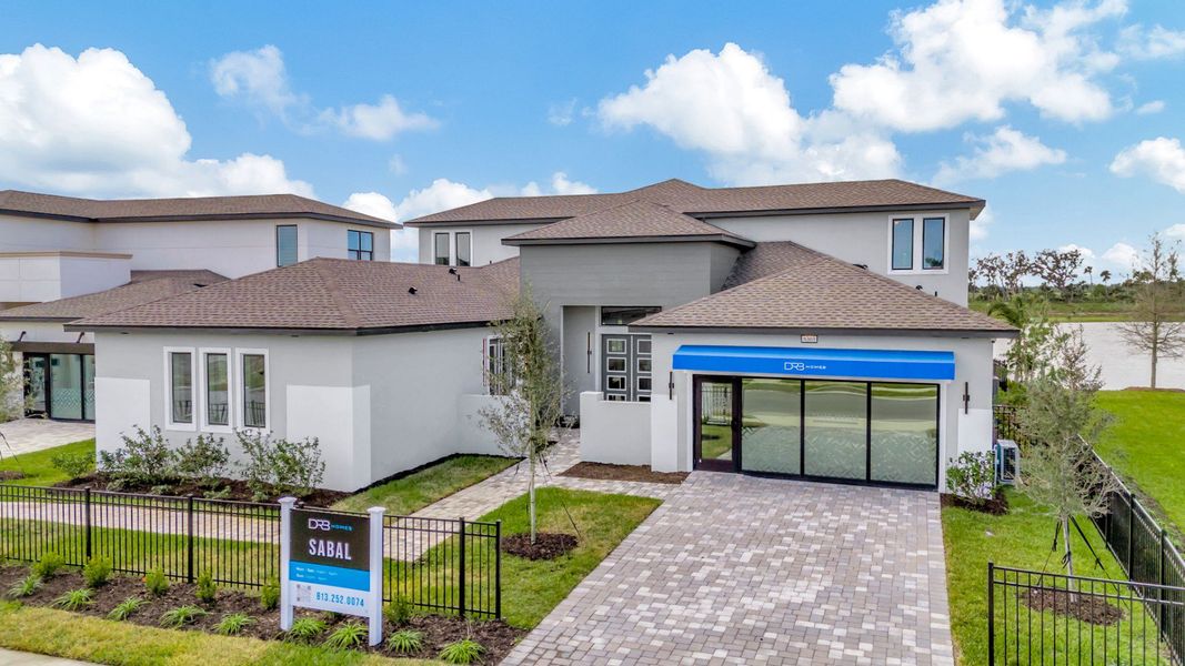 The Front Elevation of a DRB Homes Grand Sabal Model, which the home plan is offered at Serengeti in Spring Hill, FL.