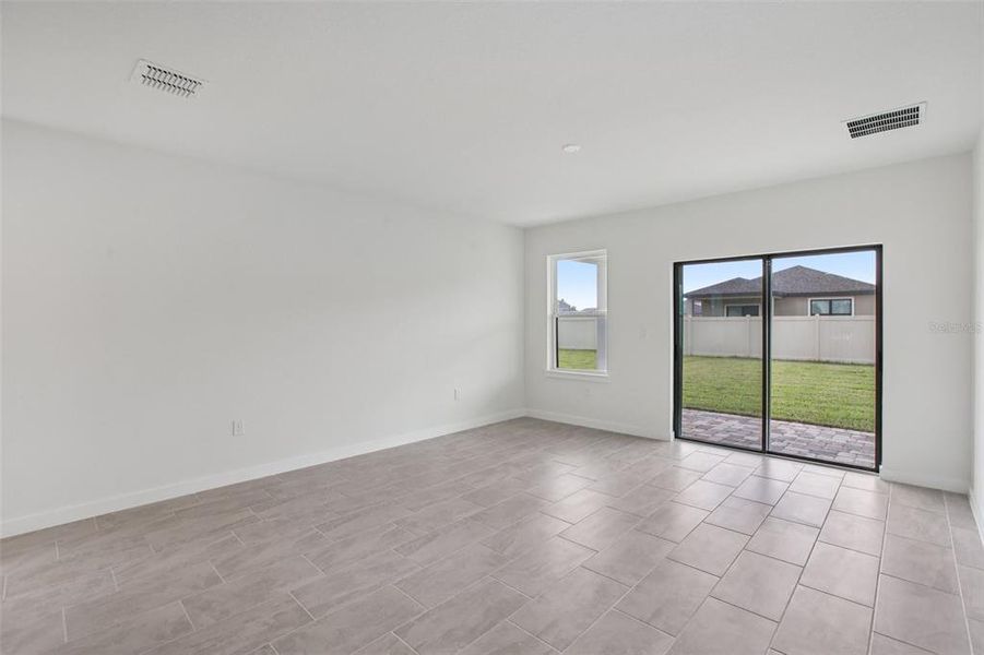 Spacious, unfurnished interior of a new home in Grasslands West, Lakeland (Image 42).