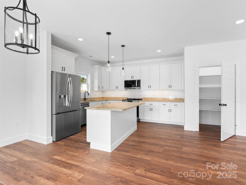 Furnished interior view inside a new home in , Waynesville (Image 13).