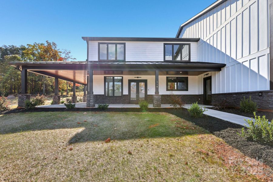 Exterior details and patio area of a home in , Mooresville (Image 24).