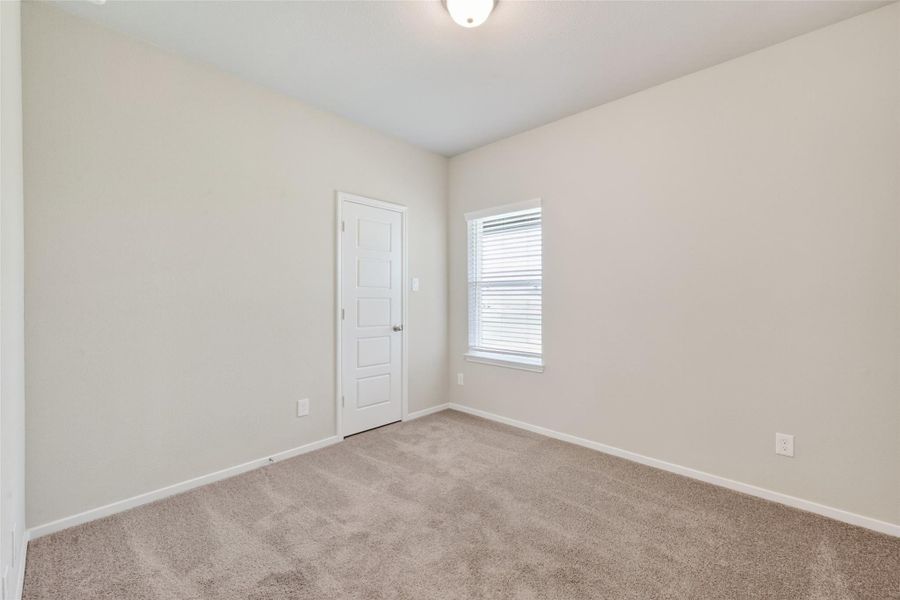 Spacious, unfurnished interior of a new home in Sunterra, Katy (Image 28).